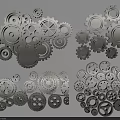 Various Metallic Gears In Different Sizes With Silver Finish On Black Background