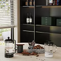 Modern Kitchen Interior With Black Shelves Wine Bottles Green Boxes Coffee Pots And Cookies