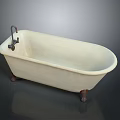 Elegant White Freestanding Bathtub With Brass Faucet And Stylish Brass Feet Design