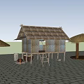 Traditional Thatched House With Straw Roof Ladder And Brick Paved Ground