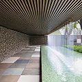Tranquil Park Landscape With Stone Wall Reflecting Pool Wooden Pergola And Lush Greenery
