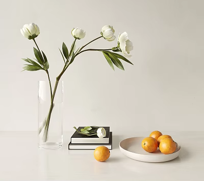Decorative Ornament Combination with White Flowers Glass Vase Stacked Books and Oranges on White Plate 3d model