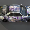 Colorful Modified Sports Car with Custom Decals Rear Spoiler and Black Wheels