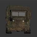 Heavy Duty Military Truck Featuring Canvas Covered Cargo Bed And Six Wheel Design