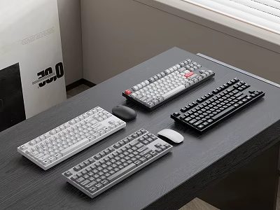 Various Colored Keyboards And Matching Mice Arranged On Dark Wooden Desktop 3d model