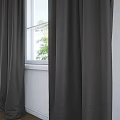 Dark Fabric Curtains Hanging By Window With Green Trees Outside Wall