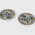 Two Oval Shaped Ceramic Plates Featuring Intricate Colorful Decorative Traditional Patterns
