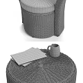 Rattan Leisure Chair with White Cushion and Side Table on Wooden Floor with Gray Wall