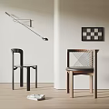 Stylish Wooden Chairs With Woven Backrest In Modern Interior With Wall Art And Floor Lamp