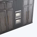 Dark Gray Wooden Kitchen Cabinets With Brass Handles And Built In Double Ovens