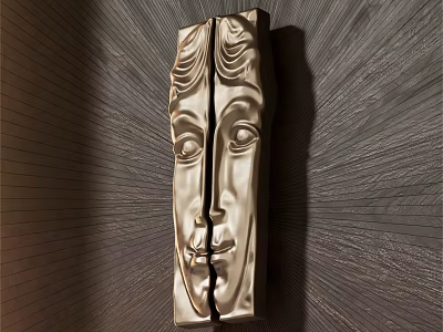 Artistic Metal Handle with Intricate Facial Carving Design Mounted on Dark Textured Wall 3d model