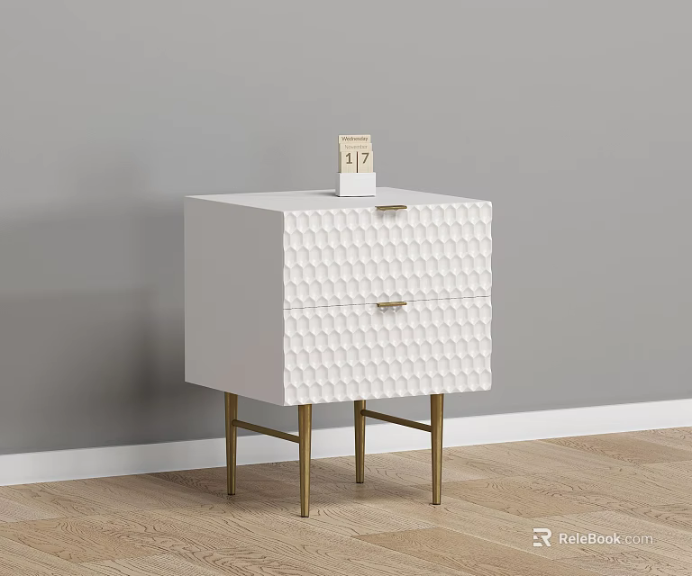 White Nightstand with Two Textured Drawers and Gold Legs Against Gray Wall on Wooden Floor 3d model 