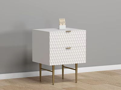 White Nightstand with Two Textured Drawers and Gold Legs Against Gray Wall on Wooden Floor 3d model