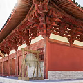 Traditional Chinese Ancient Architecture With Green Roofs Red Wooden Columns Stone Steps And Interior Statues
