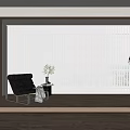 White Vertical Blinds in Modern Living Room with Black Chair Potted Plant and Wooden Floor
