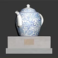 Elegant Gray Furniture Display Base With Golden Plaque And Blue White Floral Teapot