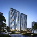 Modern High Rise Residential Building Exterior With Greenery And Evening Lighting