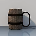 Wooden Barrel Shaped Decorative Ornament Set With Black Bands On Smooth Surface
