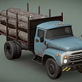 Old Blue Truck Loaded With Stacked Wood Logs For Building Materials