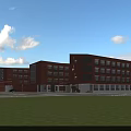 Modern School Building With Red Brick Exterior Large Glass Windows Symmetrical Entrance And Green Lawn