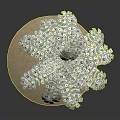 Decorative Palm Tree With Golden Trunk And Green Leaves On Sandy Base