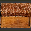 Decorative Orange Carved Wooden Clothing Accessory Storage Box with Open Lid and Intricate Patterns