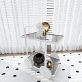 Modern Black Metal Frame Side Table with Glass Shelves Vase Books and Golden Decor