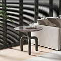Modern Side Table with Marble Top Curved Legs by White Sofa Blinds Holding Book Item