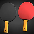 Two Table Tennis Rackets With Black Red Faces And Yellow Handles With Stars