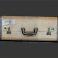 Vintage Brown Travel Suitcase With Leather Straps Metal Clasps And Retro Handle Design