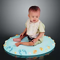 Adorable Baby Sitting on Blue Round Mat with Decorative Footprints and Flowers