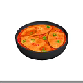 Orange Fish Fillets in Black Bowl with Red Broth Chili Peppers and Cilantro Garnish