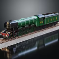 Vintage Green Steam Train Model With LNER Logo On Railway Track