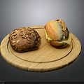 Fresh Homemade Breads on Wooden Round Tray One with Pumpkin Seeds and Sliced with Cheese