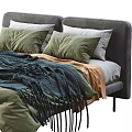 Modern Double Bed With Gray Headboard Green White Pillows And Blue Orange Blankets