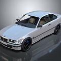 Silver Two Door Coupe Car With Black Wheels And Shiny Exterior Design