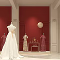 Elegant Bridal Shop Display With Red Walls White Pillars And Wedding Dress Mannequins