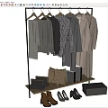 Stylish Clothing On Metal Clothes Rack With Handbags And Neutral Tones