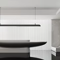 Modern Reception Area With Black Desk Long Pendant Light Striped Backdrop And Marble Wall Sculpture