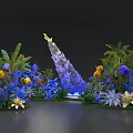 Colorful Floral Decorative Arrangement With Blue Yellow Purple Flowers And Green Plants