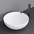 Modern White Round Above Counter Wash Basin With Black Faucet On Gray Countertop