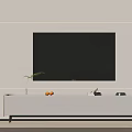 Modern White TV Stand With Large Black TV Screen Plant Oranges Books and Black Device