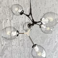 Modern Glass Globe Chandelier With Metal Frame For Interior Lighting Design