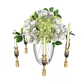 White And Green Hydrangea Flowers In Glass Vase With Gold Candle Holders