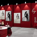 Elegant Wedding Stage With Red Backdrop Bridal Photos And Floral Decorations