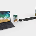 Modern Computer Setup with Laptop Tablet Monitor Mouse and Keyboard