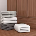Folded Towels In Gray White And Light Gray On Wooden Cabinet And Floor