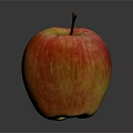 Fresh Red and Yellow Striped Apple With Stem on Dark Background Showing Reflection
