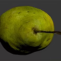 Ripe Yellow Pear With Speckled Skin On Dark Reflective Surface