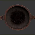 Hand Carved Artisan Bowl With Dual Handles And Dark Textured Surface